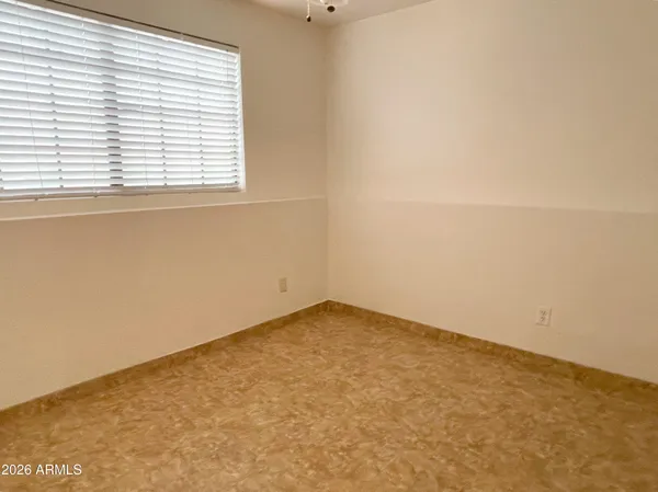 an empty room with a window
