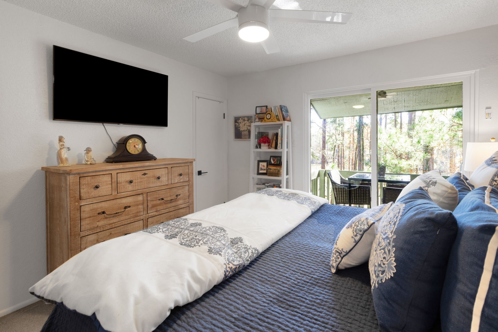 154 Villa Way Coldspring, TX 77331 - Photo 19 of 42 The primary bedroom has its own private balcony and walk in closet