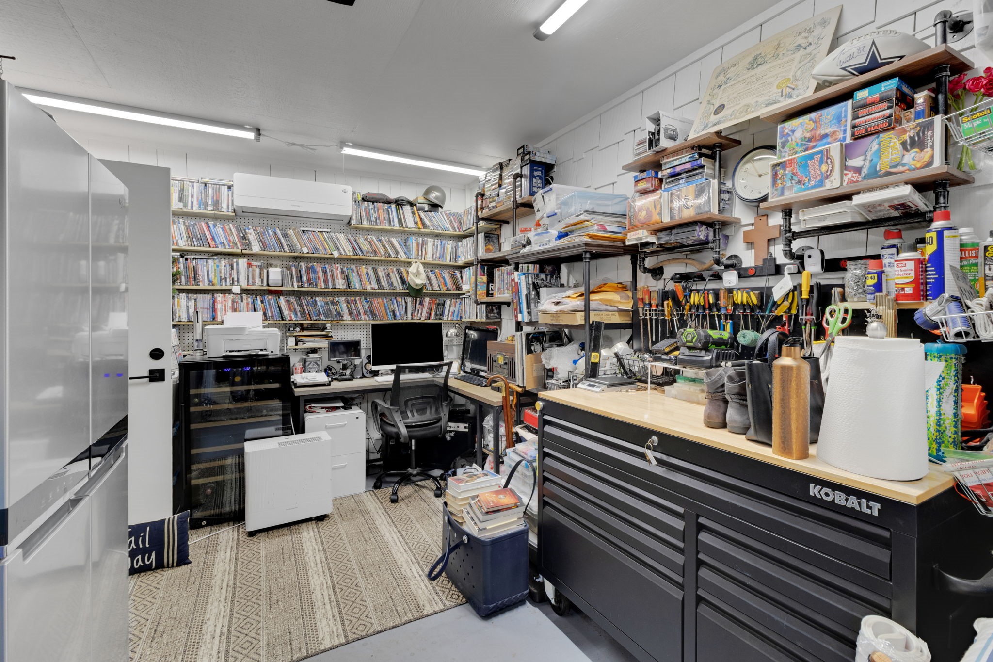 154 Villa Way Coldspring, TX 77331 - Photo 25 of 42 The 210 sf garage has been converted into an air conditioned office, storage and workout room with mini-split