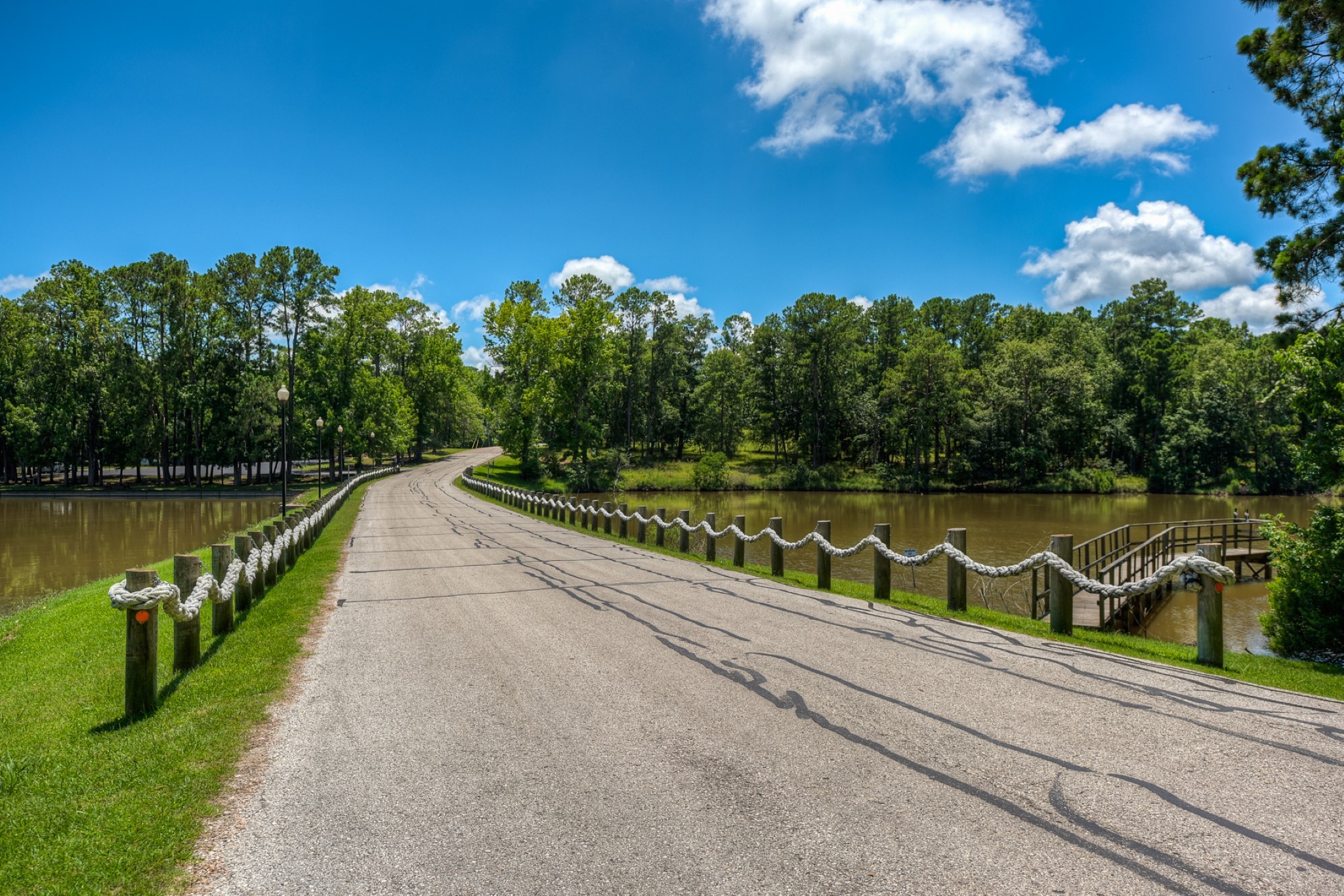 154 Villa Way Coldspring, TX 77331 - Photo 37 of 42 Cape Royale marina causeway - he marina lagoon is to the right