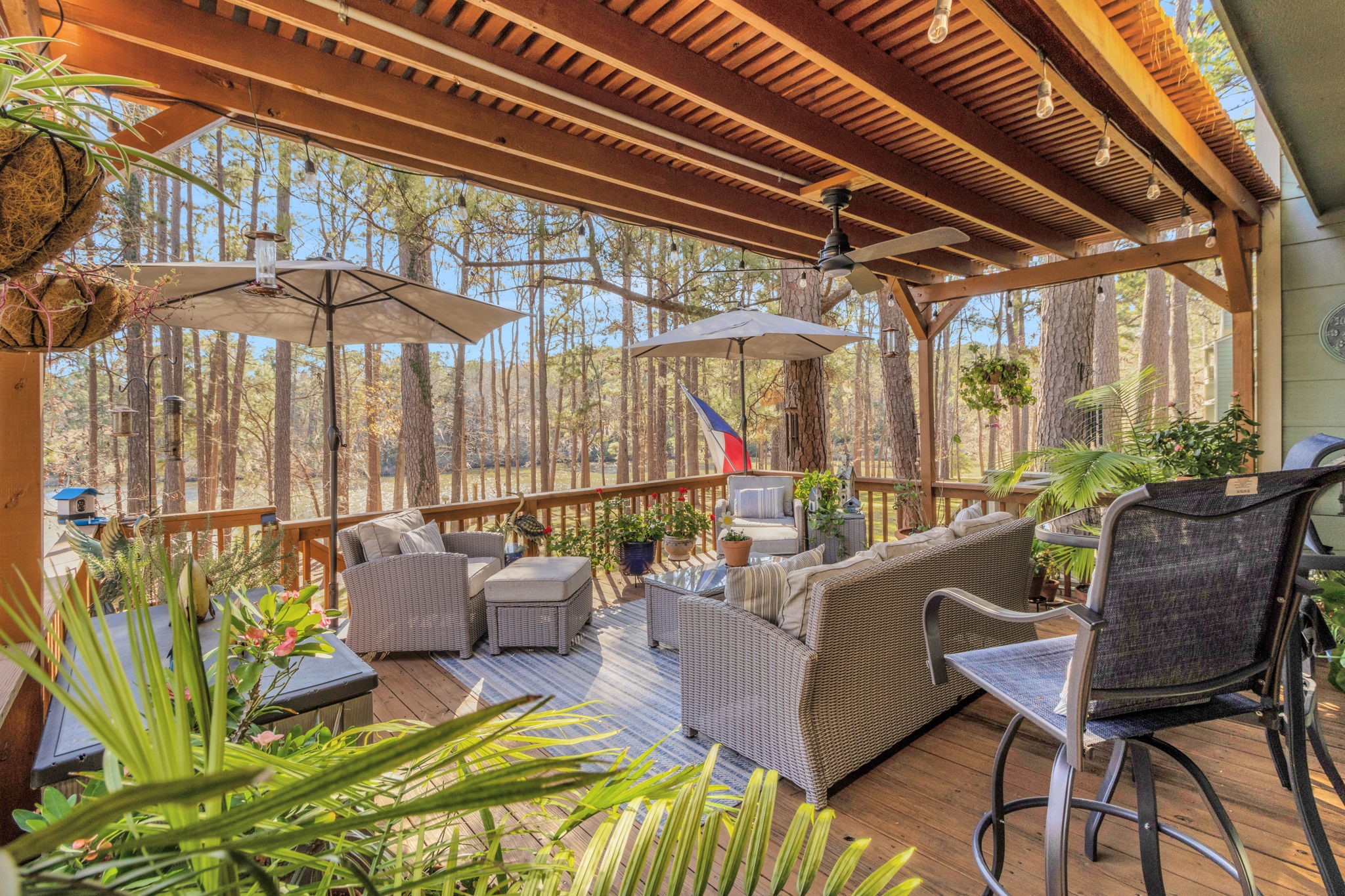 154 Villa Way Coldspring, TX 77331 - Photo 6 of 42 Move effortlessly from the living area to this fabulous back deck. This is where you will want to be!