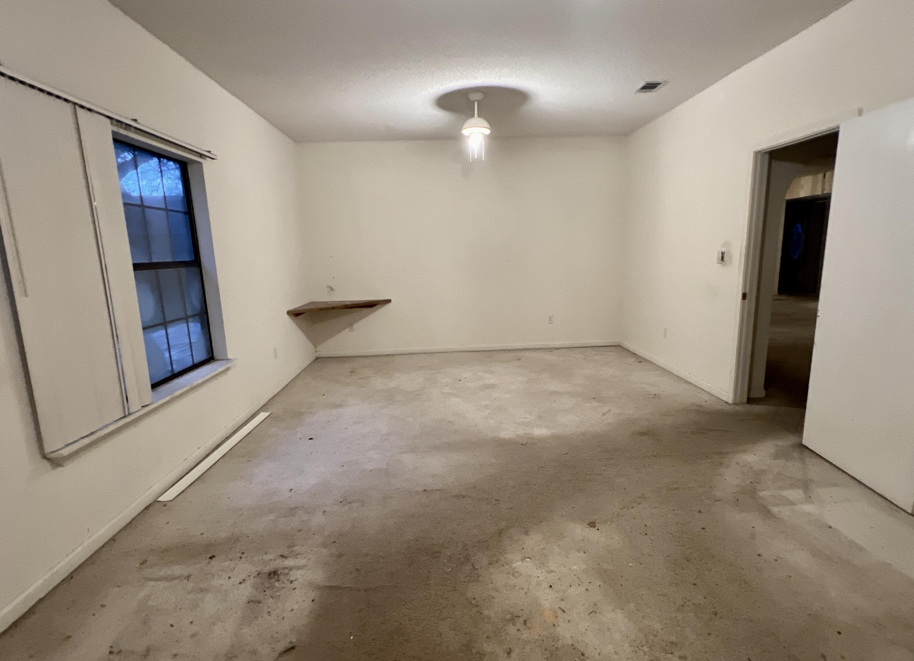 4746 Pebble Creek Drive Pensacola, FL 32526 - Photo 4 of 23 an empty room with a bathroom
