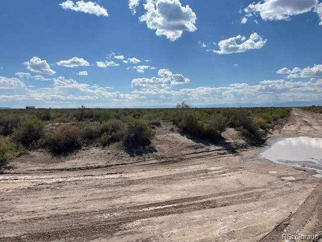 a view of a chandelier with a table