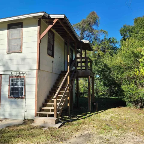 a view of outdoor space and front view of a house