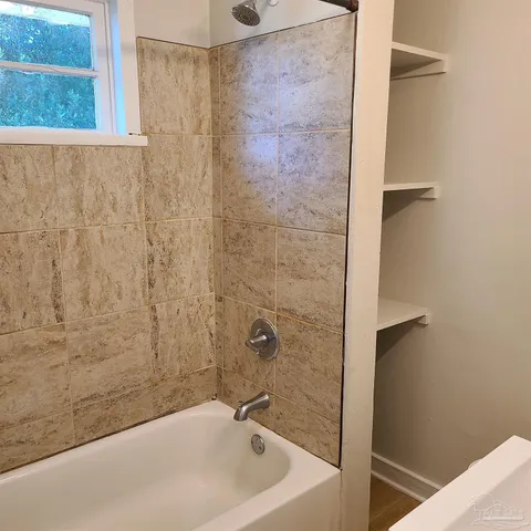 a bathroom with a bathtub