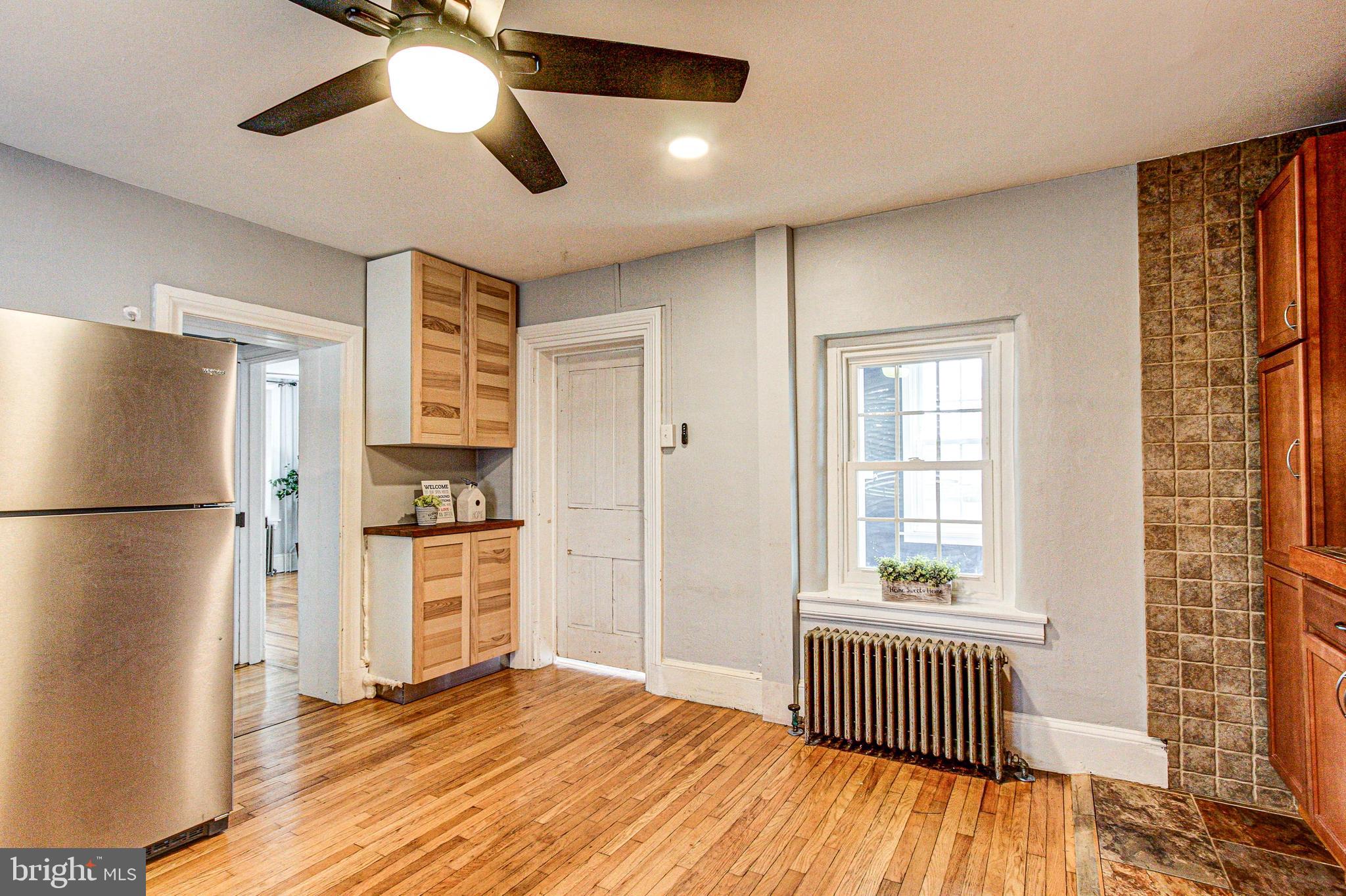 1079 Old Skippack Road Harleysville, PA 19438 - Photo 19 of 53 a kitchen with stainless steel appliances a refrigerator and a stove top oven