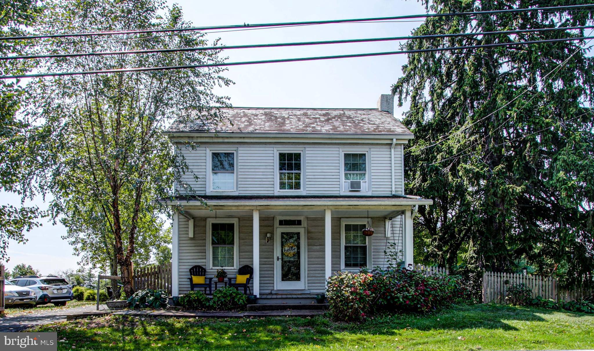 1079 Old Skippack Road Harleysville, PA 19438 - Photo 2 of 53 a front view of a house with garden