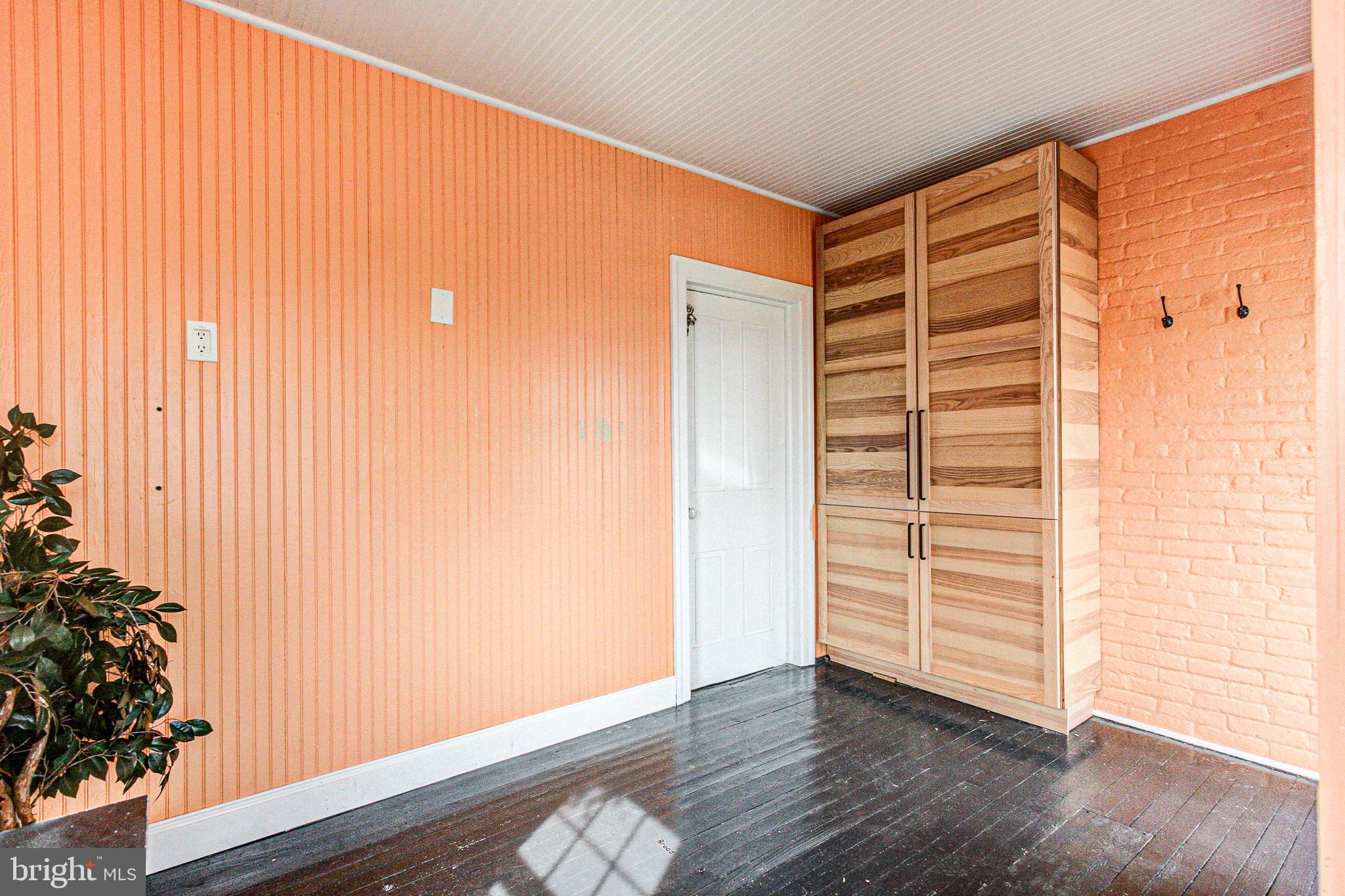 1079 Old Skippack Road Harleysville, PA 19438 - Photo 26 of 53 an empty room with wooden floor and windows