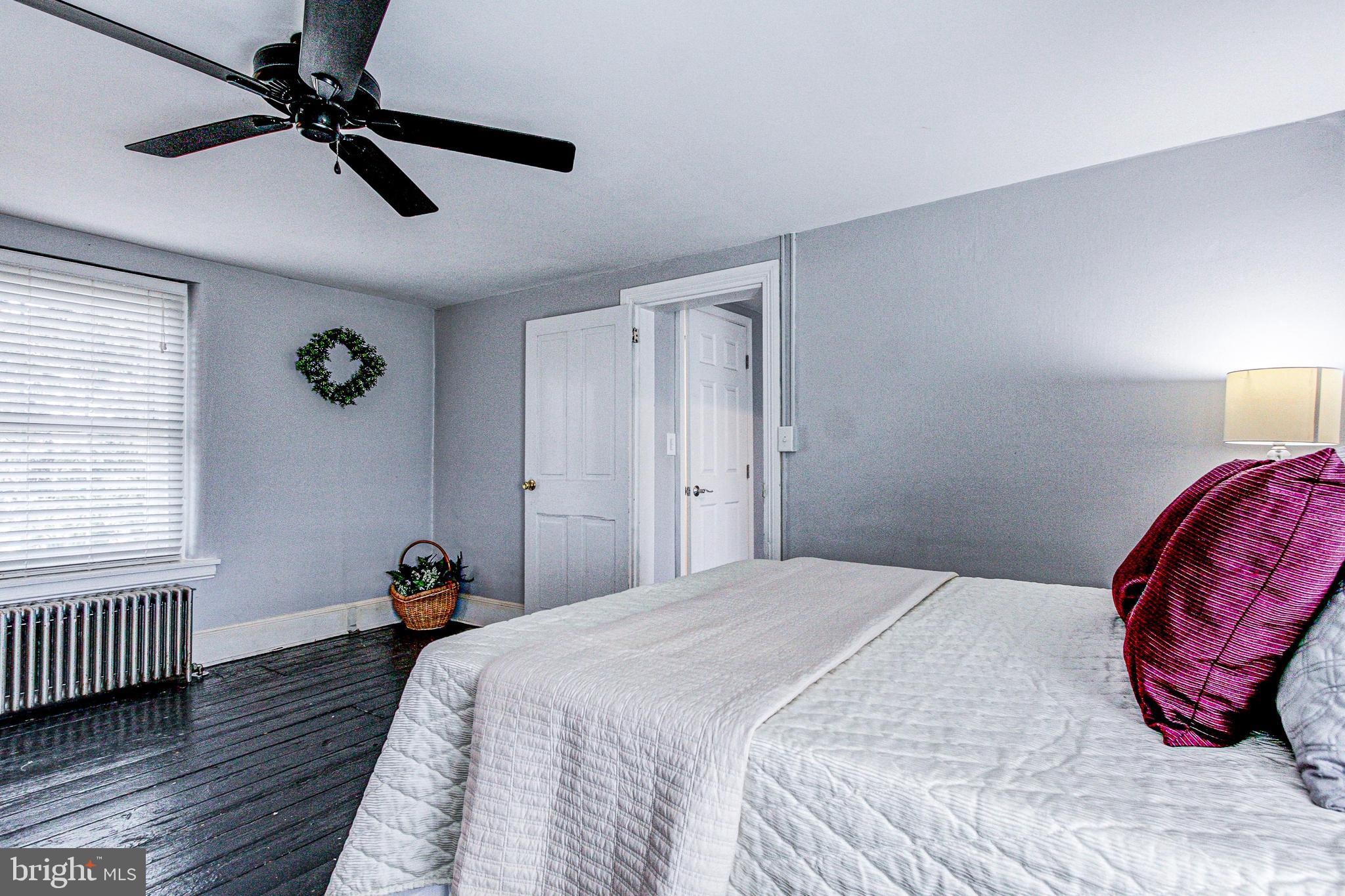 1079 Old Skippack Road Harleysville, PA 19438 - Photo 30 of 53 a bedroom with a bed and a window