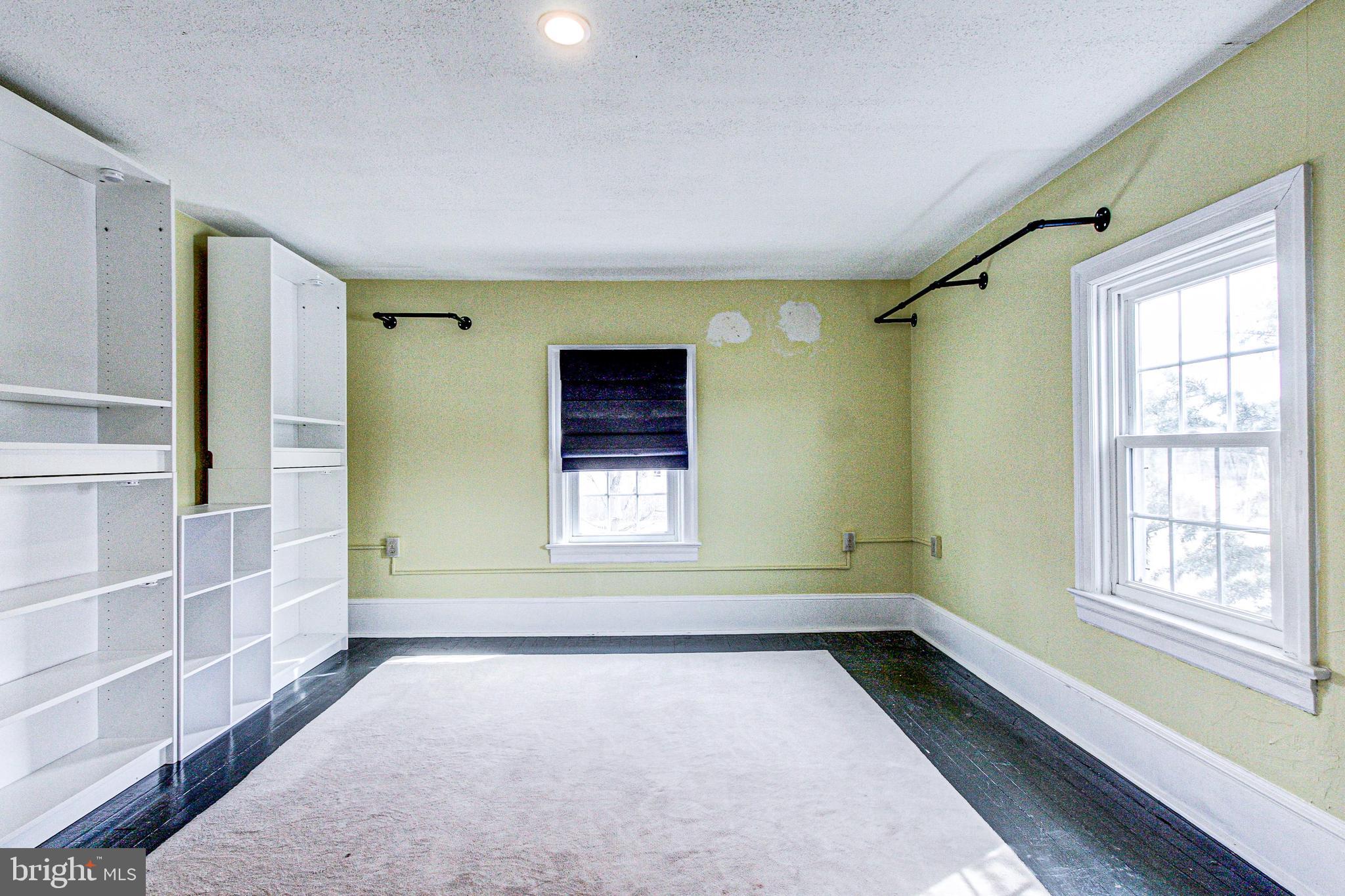 1079 Old Skippack Road Harleysville, PA 19438 - Photo 32 of 53 a view of an empty room with a window