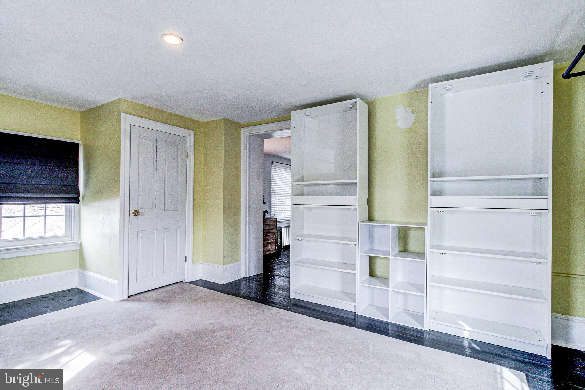 1079 Old Skippack Road Harleysville, PA 19438 - Photo 34 of 53 an empty room with windows and closet