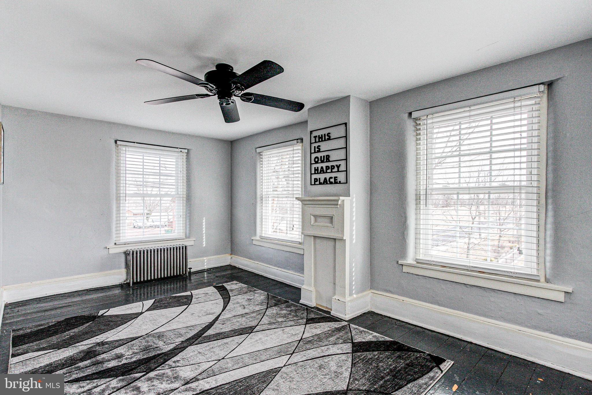 1079 Old Skippack Road Harleysville, PA 19438 - Photo 36 of 53 a bedroom with furniture window and wooden floor