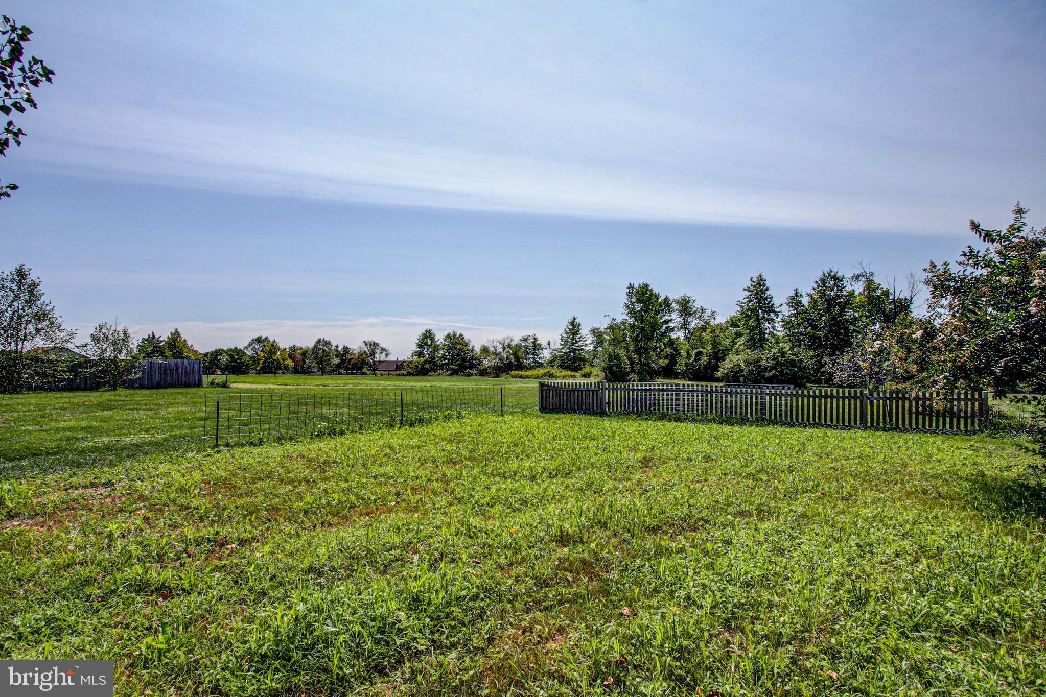 1079 Old Skippack Road Harleysville, PA 19438 - Photo 46 of 53 a view of a golf course with a lake