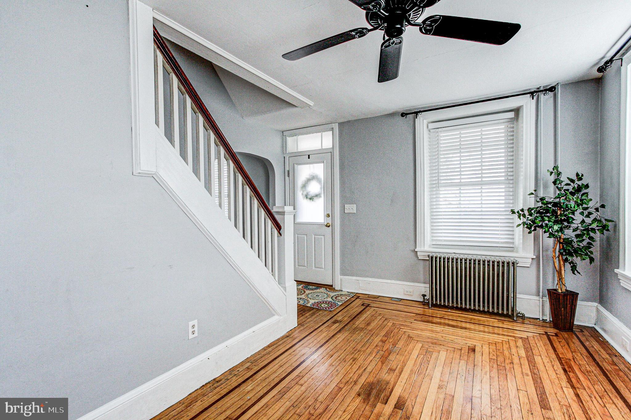 1079 Old Skippack Road Harleysville, PA 19438 - Photo 10 of 53 a view of empty room with wooden floor and fan