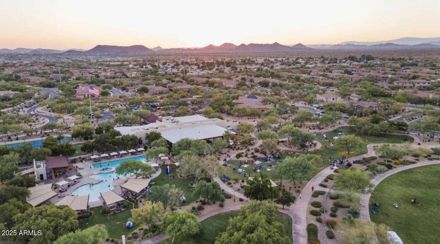 3935 East Rough Rider Road, Unit 1057 Phoenix, AZ 85050 - Photo 29 of 41 an aerial view of residential house and sandy dunes
