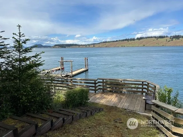 a view of a lake with a big yard