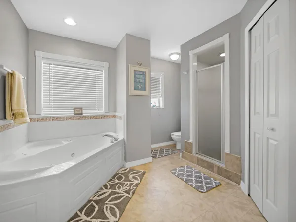 a bathroom with a bathtub sink and toilet