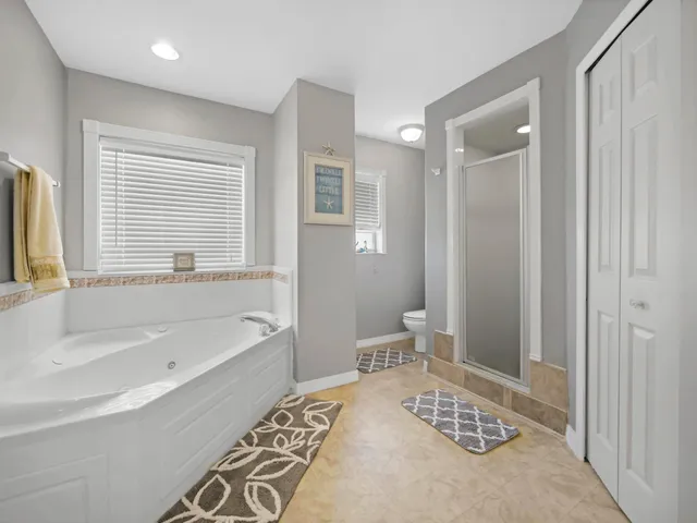 a bathroom with a bathtub sink and toilet