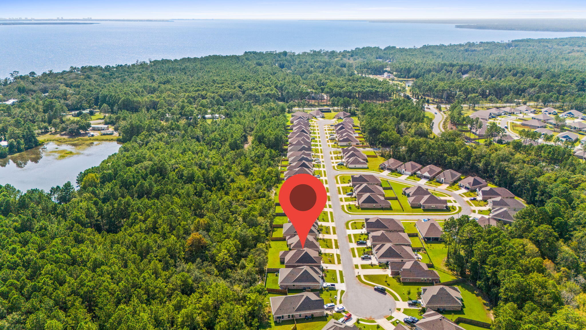 124 Apollo Avenue Freeport, FL 32439 - Photo 50 of 119 17-web-or-mls-7-print-DJI_20250820153123