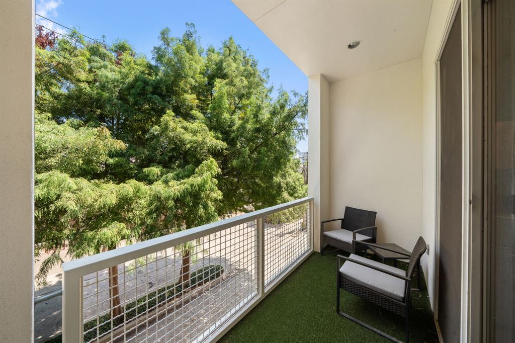 4060 Travis Street, Unit 12 Dallas, TX 75204 - Photo 20 of 20 a view of a balcony with chairs