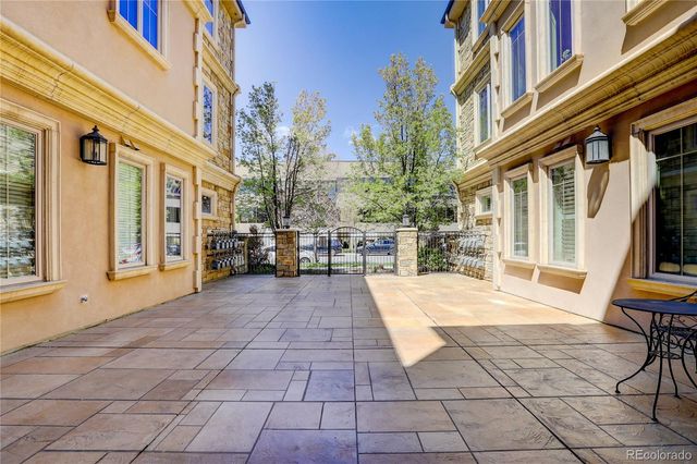 a front view of a building with a outdoor space