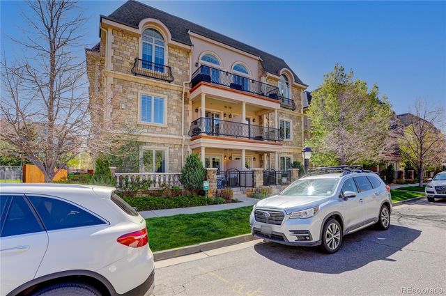 a car parked in front of a house