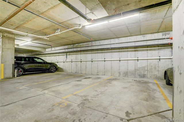 a view of a garage with car parked