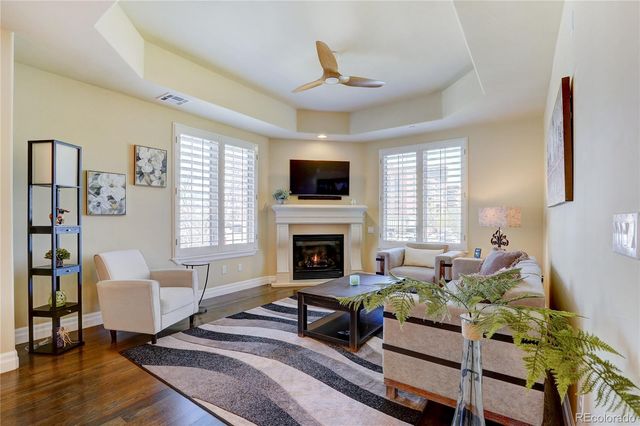 a spacious bathroom with a double vanity sink a large mirror and shower