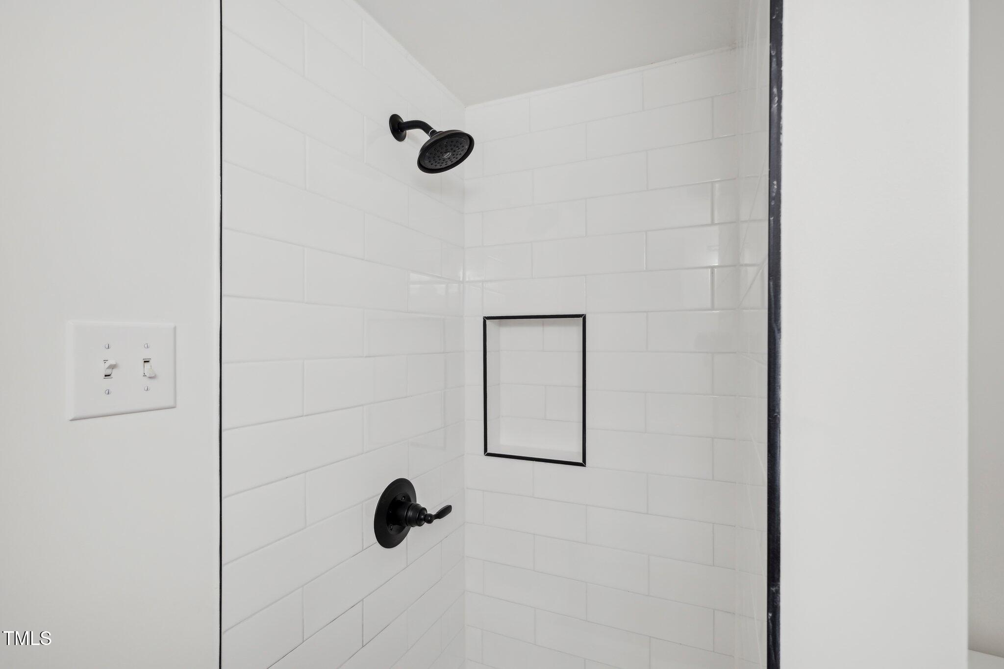 4815 Oak Park Road Raleigh, NC 27612 - Photo 26 of 50 a bathroom with a shower