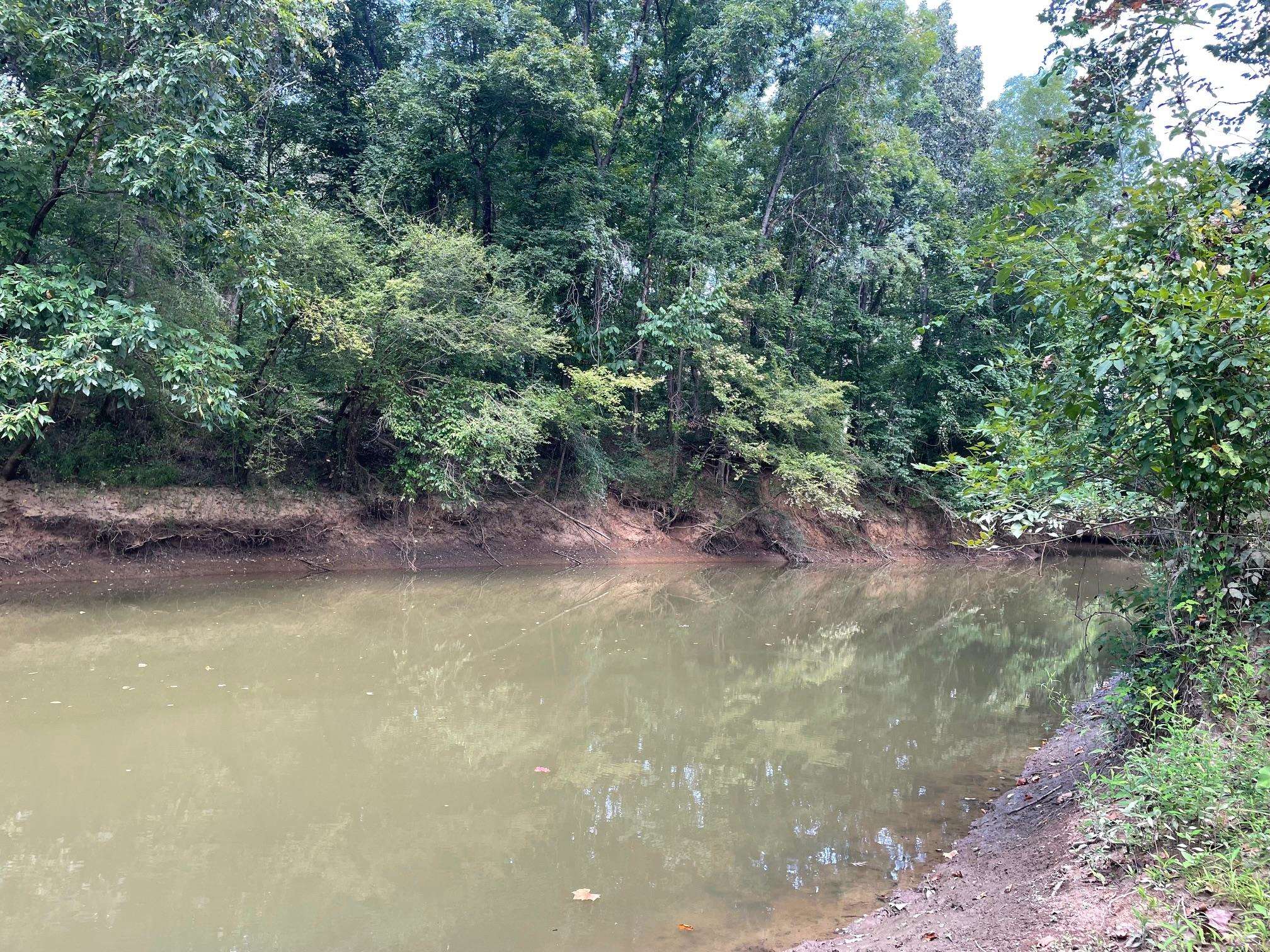 a view of a lake with outdoor space