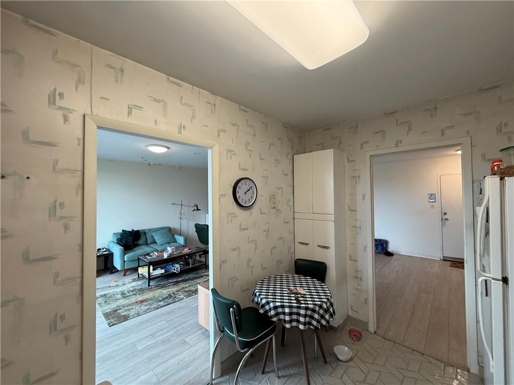 5100 Fifth Avenue, Unit 509 Pittsburgh, PA 15232 - Photo 15 of 26 a view of a livingroom with furniture and wooden floor