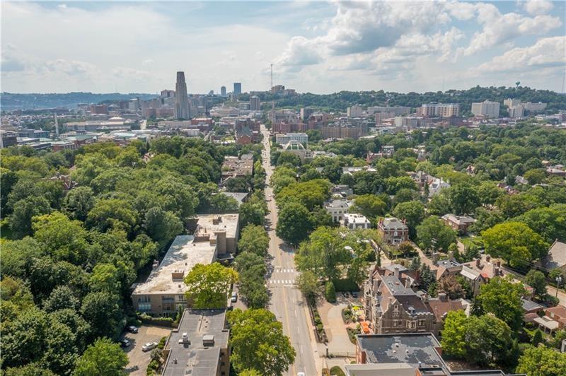 5100 Fifth Avenue, Unit 509 Pittsburgh, PA 15232 - Photo 2 of 26 an aerial view of a city with lots of residential buildings