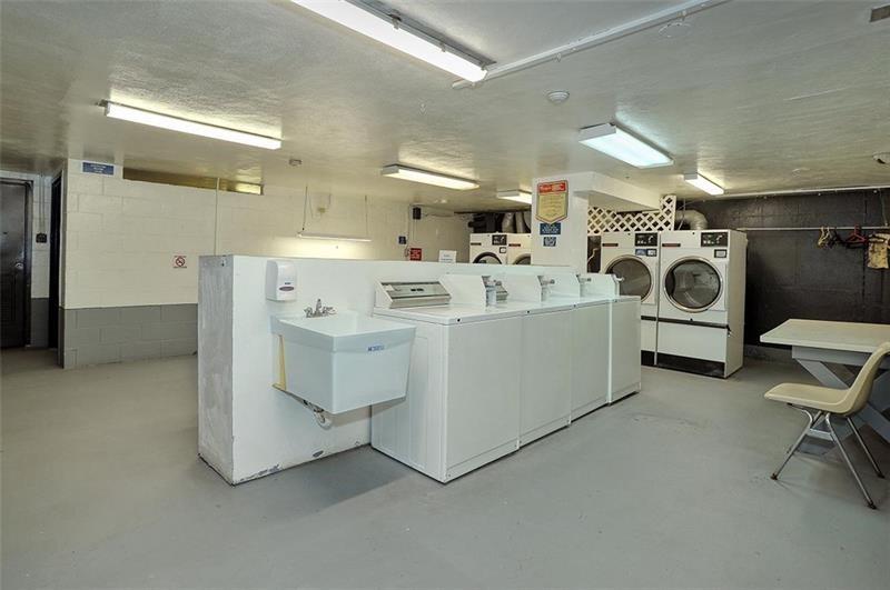 5100 Fifth Avenue, Unit 509 Pittsburgh, PA 15232 - Photo 25 of 26 a utility room with dryer and washer