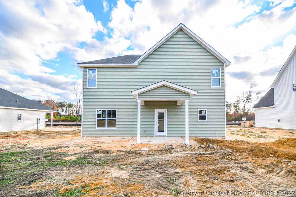 672 Barlow Road Parkton, NC 28371 - Photo 17 of 17 a view of a house with a yard