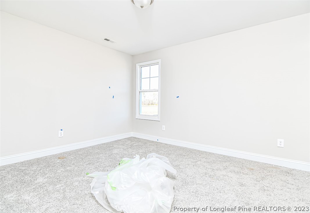 672 Barlow Road Parkton, NC 28371 - Photo 8 of 17 a view of a room with a window