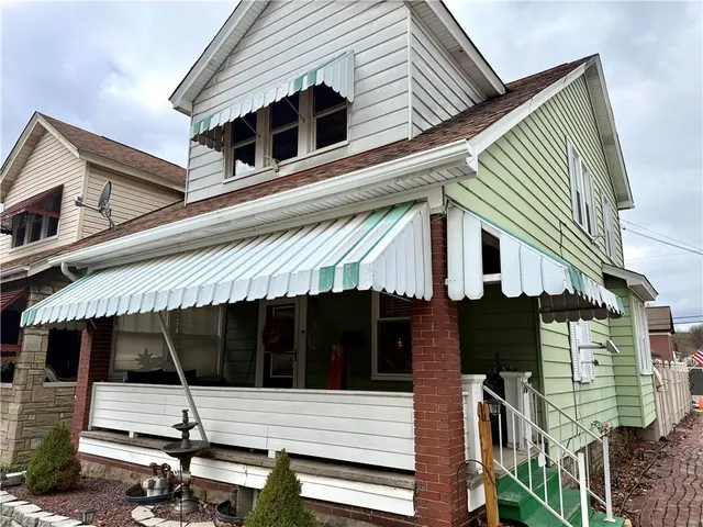 a view of a house with garage