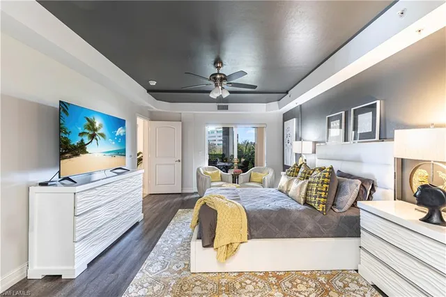 a living room with furniture fireplace and flat screen tv