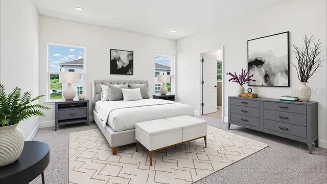 a bedroom with a bed and a couch