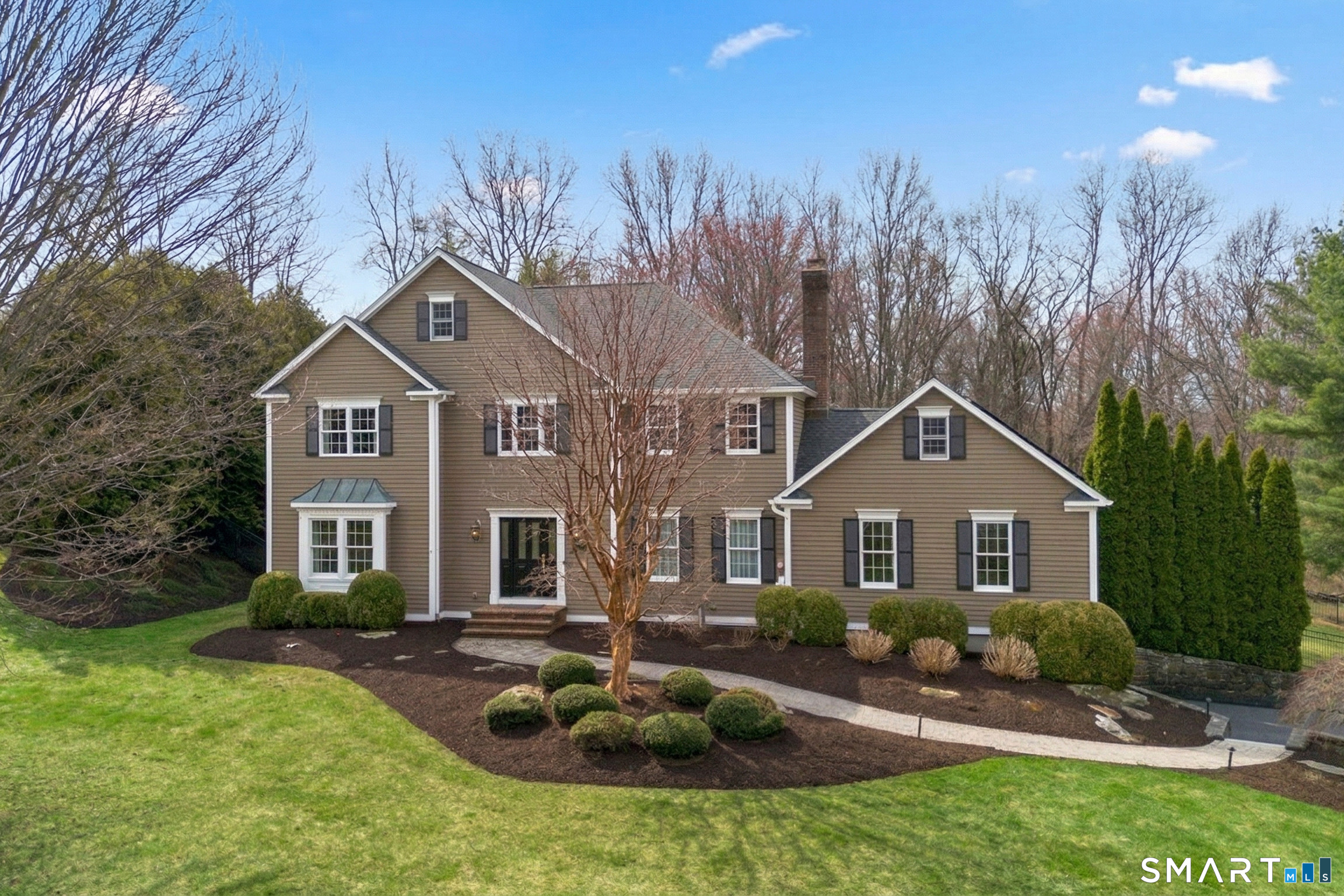16 Shadowood Lane Trumbull, CT 06611 - Photo 1 of 39 a front view of a house with garden