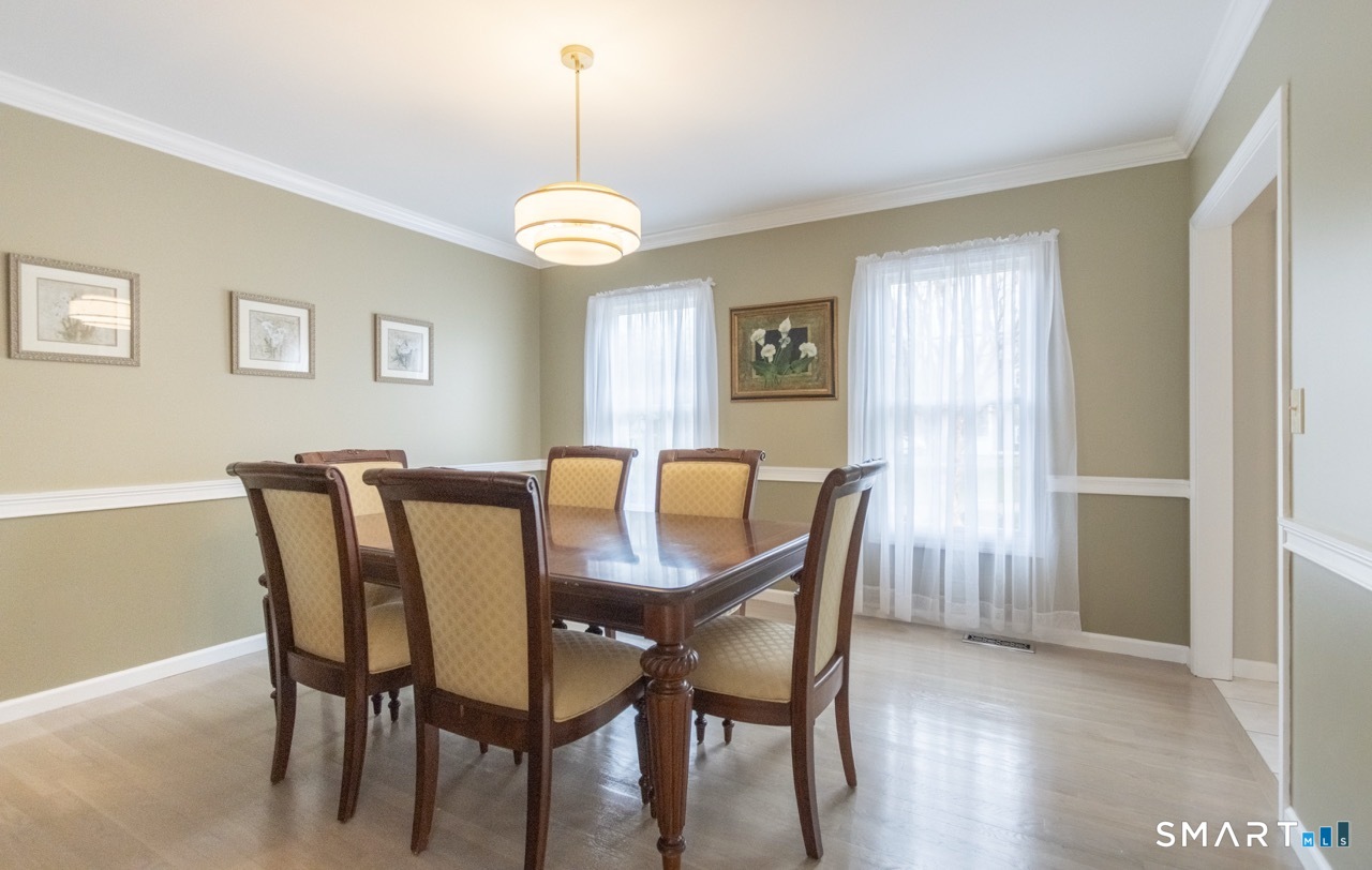 16 Shadowood Lane Trumbull, CT 06611 - Photo 13 of 39 a view of a dining room with furniture and window