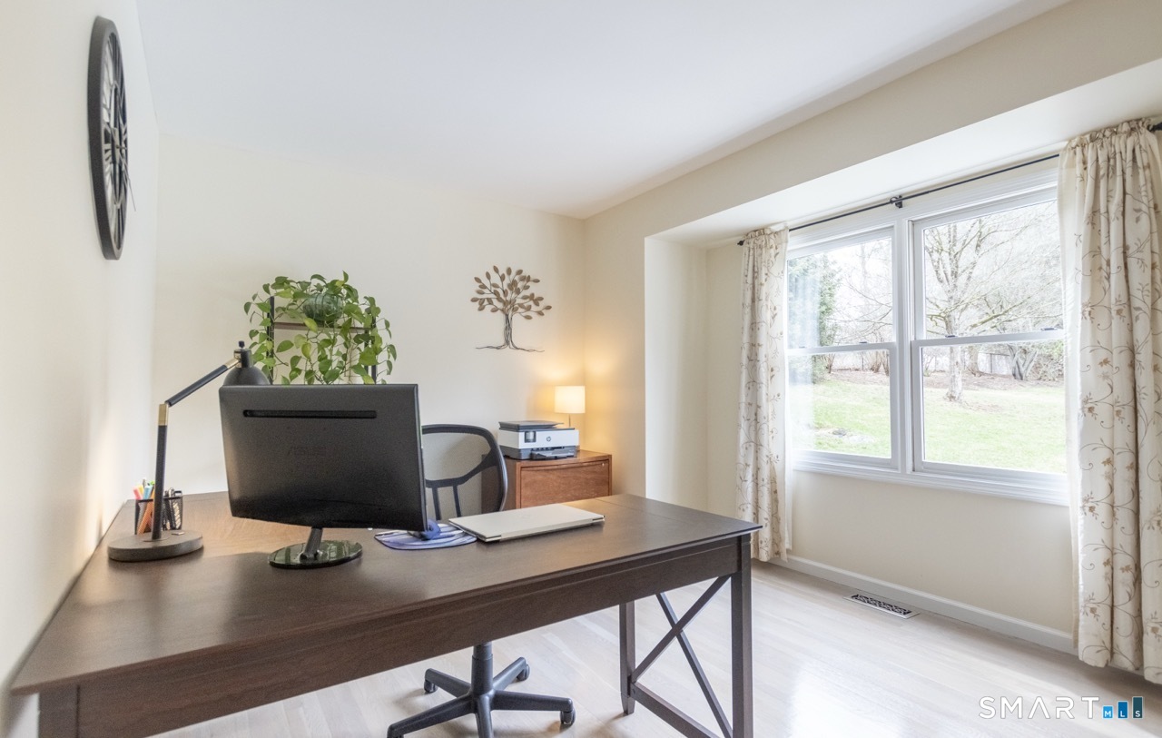 16 Shadowood Lane Trumbull, CT 06611 - Photo 15 of 39 a view of a workspace with furniture and a window