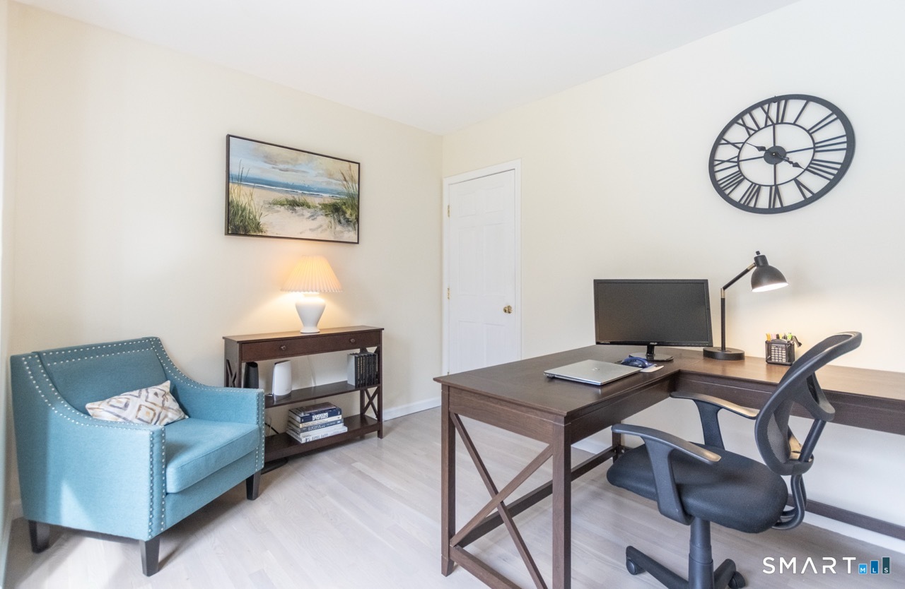 16 Shadowood Lane Trumbull, CT 06611 - Photo 16 of 39 a workspace with furniture and a desk