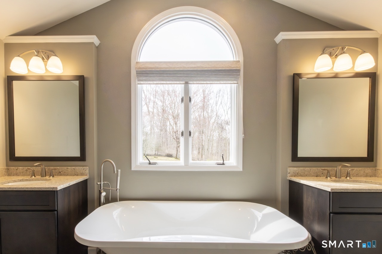 16 Shadowood Lane Trumbull, CT 06611 - Photo 19 of 39 a white bath tub sitting next to a white sink
