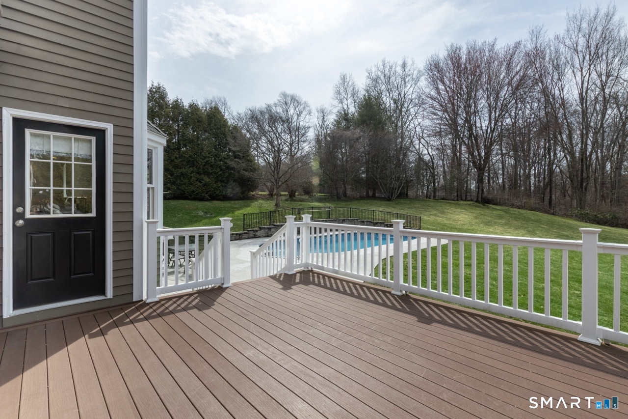 16 Shadowood Lane Trumbull, CT 06611 - Photo 29 of 39 a balcony with wooden floor and fence