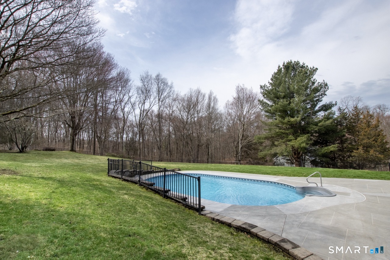 16 Shadowood Lane Trumbull, CT 06611 - Photo 33 of 39 a view of a backyard with large trees