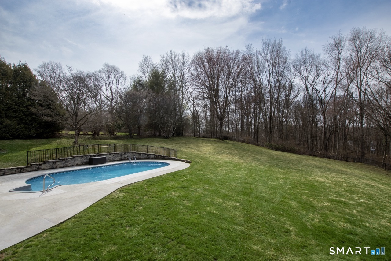 16 Shadowood Lane Trumbull, CT 06611 - Photo 34 of 39 a view of a backyard with large trees