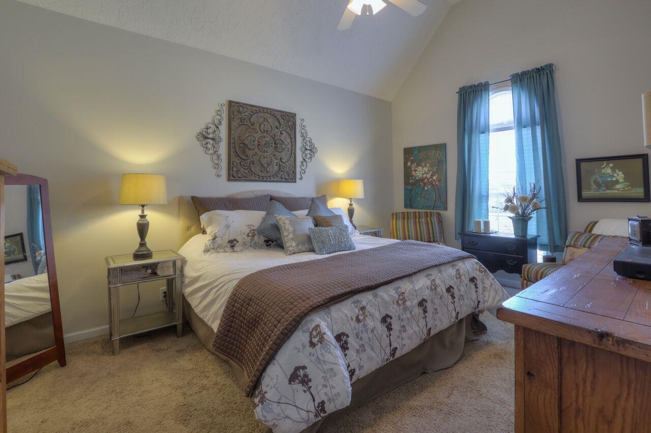693 Crescent Road Murfreesboro, TN 37128 - Photo 11 of 23 a bedroom with a bed and a dresser