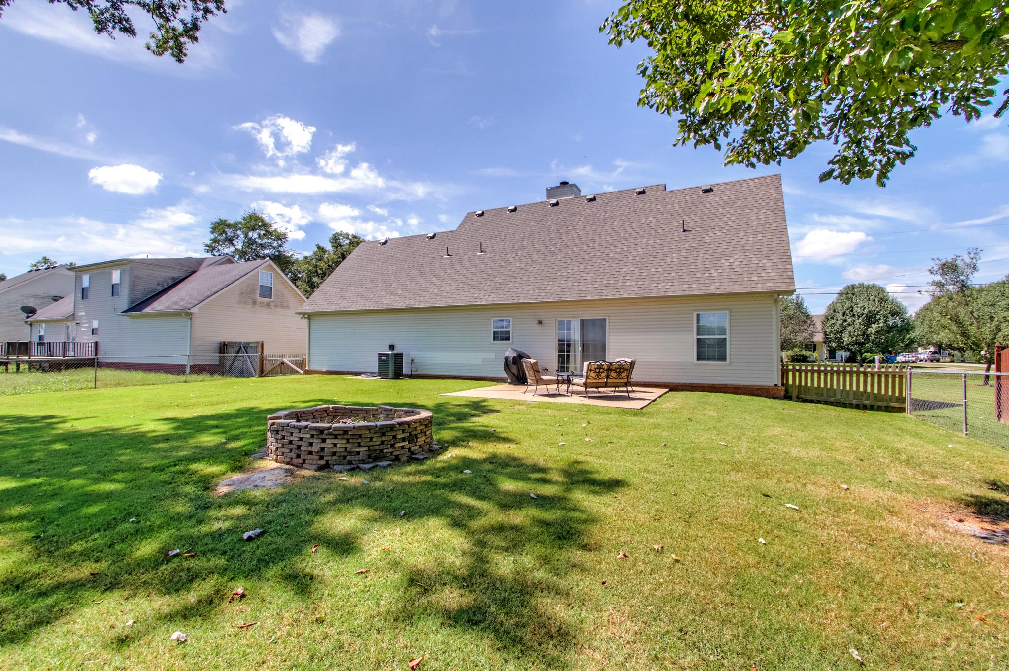 693 Crescent Road Murfreesboro, TN 37128 - Photo 23 of 23 a aerial view of a house with swimming pool yard and outdoor seating