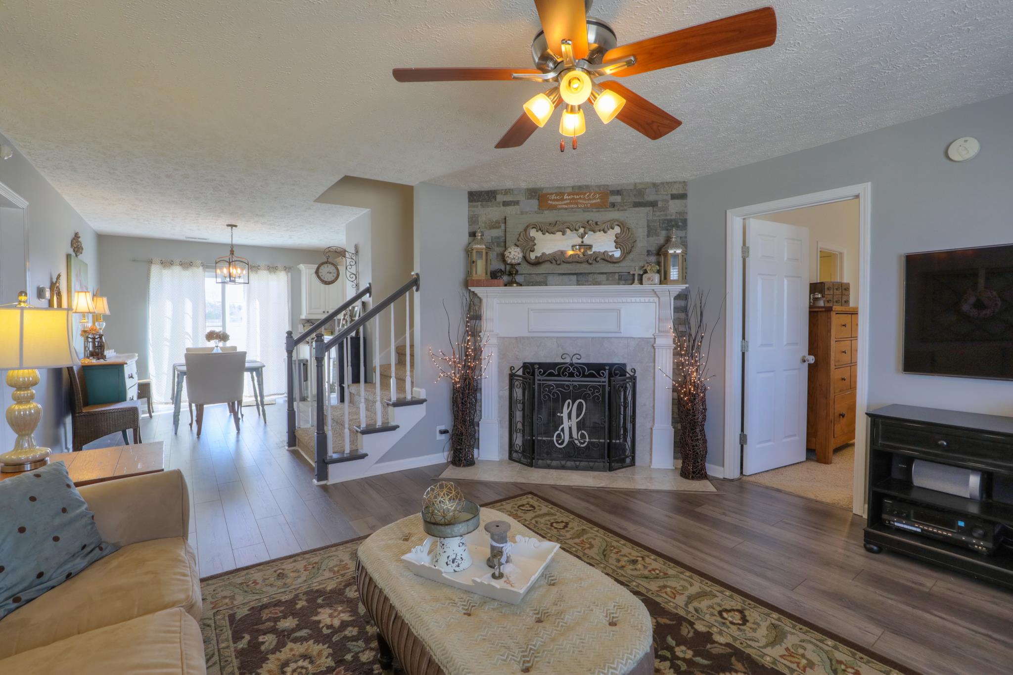 693 Crescent Road Murfreesboro, TN 37128 - Photo 3 of 23 a living room with furniture and a fireplace