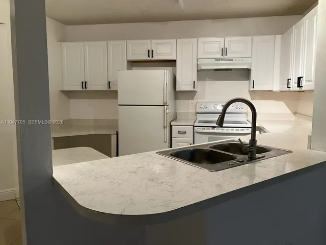 $1,950 | 4035 West McNab Road, Unit F104, Pompano Beach, FL 33069